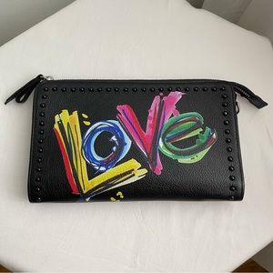 Small black genuine leather Brighton crossbody handbag